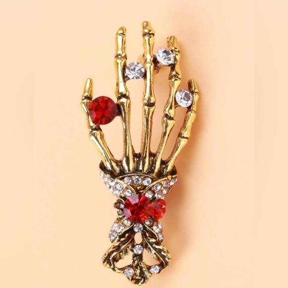 Gold plated red and white crystal skeleton hand necklace/brooch - Picture 5 of 11